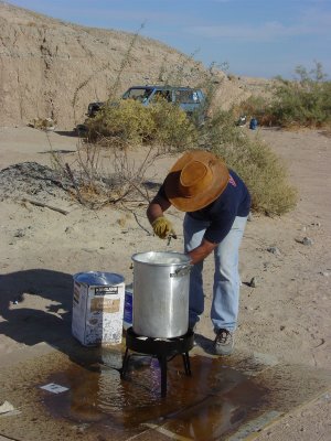 What A messly way to cook !!! My camp in background .