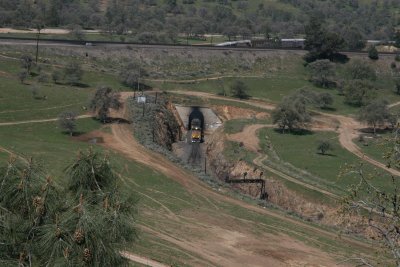  You can see cars on other side of tunnel as train start to make way around loop