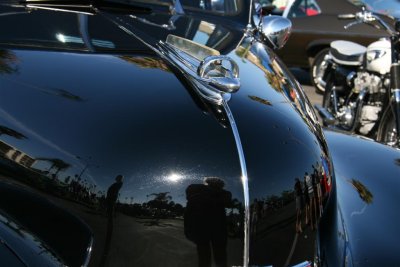 Reflection in hood of this 40 chevy .