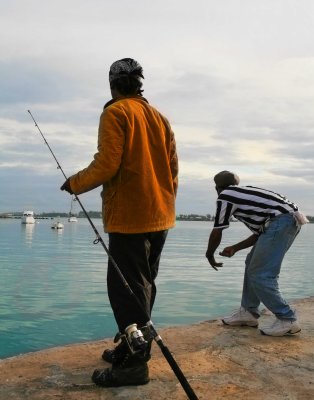 Guys fishing from public wharf