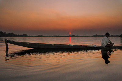 Boat at Sunset. Mekong