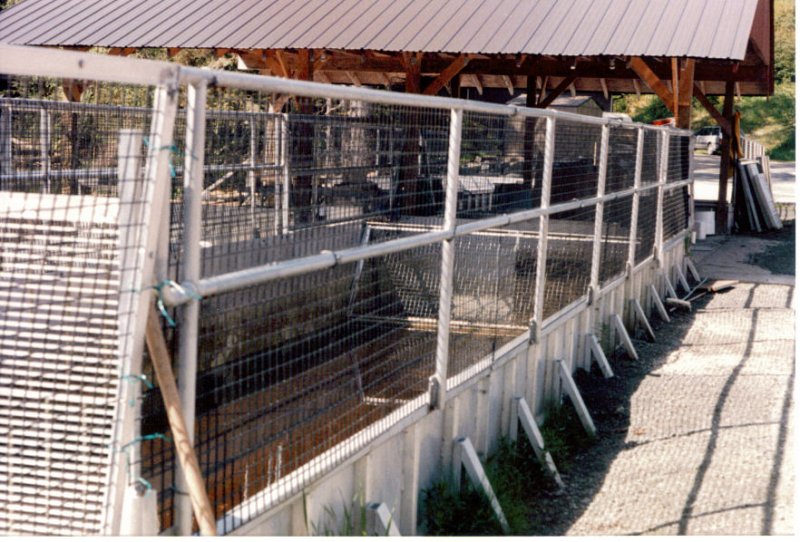 empty adult holding ponds w crowder and spawning shed.jpg