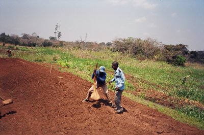 Pounding to make the pond watertight.JPG