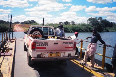 Crossing the Chambeshi by hand-pulled ferry.