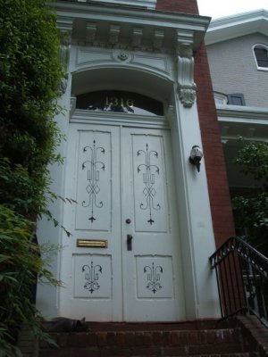 Down the street, this great door (see the kitty?)