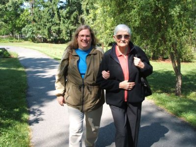 Barbara and mom hiking up the driveway