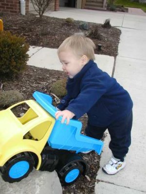 playing with his dump truck