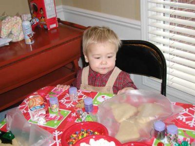 at christmas party- joey is thinking about decorating cookies