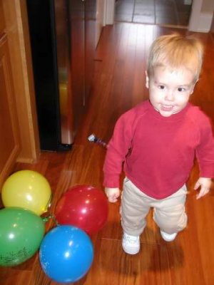 boy with his balloons
