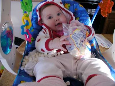 marshmallow girl- oops!  mommy looked away for a few