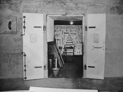 Btry Townsley  test door A open 1943. Shows tool room interior.