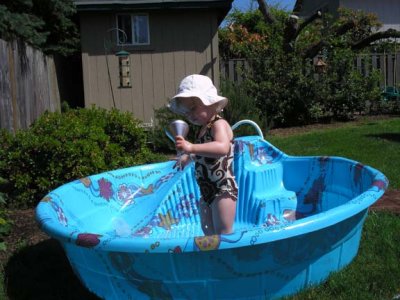 Astrid in her new wading pool in our backyard