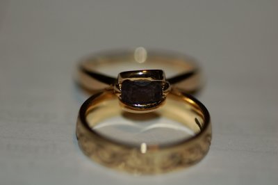 Two gold bands for a golden couple : a stone for their love.jpg