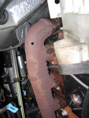Exhaust manifold drilled and tapped.
