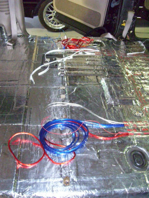 Wires run to the two amps under passenger captain seats.
