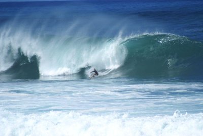 Surfing at Banzai Pipeline