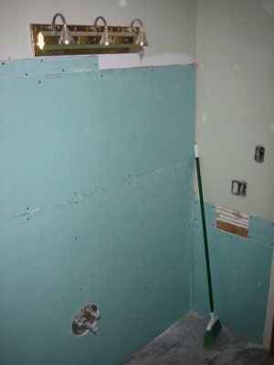 Green board installed on vanity wall