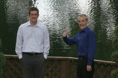 The boys looking for fish/turtles