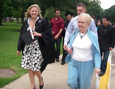 Allie walking with Gammer and Chris