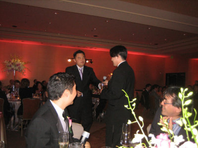 Kev hands off the mic to Shog for the Best Man's speech