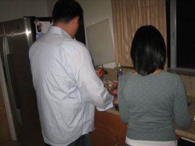 ricky and ines setting up the strawberry champagne flutes