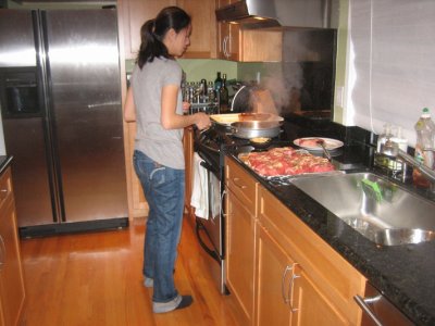 Agnes cookin' up some NY Steaks