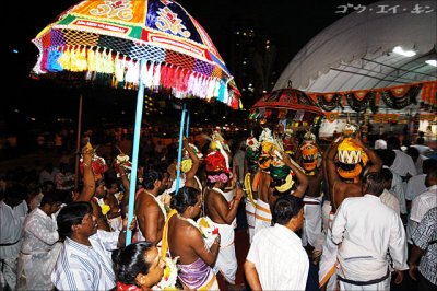 procession enters outdoor shrine