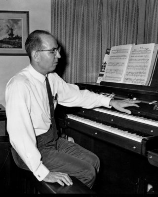 Dad with Organ he Built.jpg