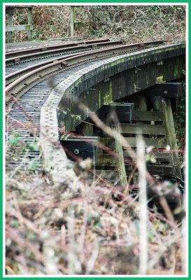 Abandoned trestle over small creek.