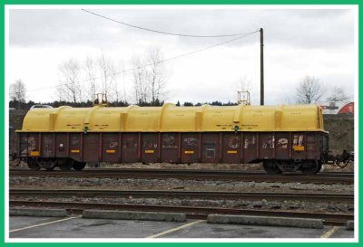 Covered gondola car.