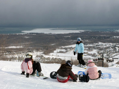 Snowboarders at the top of Blue Mountain