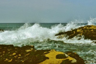 Surf on rocks.