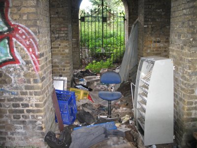 Gated, locked area under Surrey side of bridge.