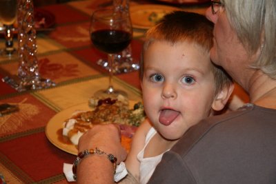 Preston took his place on Grandma's lap during Thanksgiving dinner