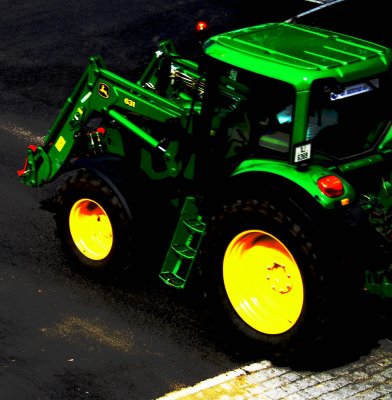 Green tractor but yellow wheels