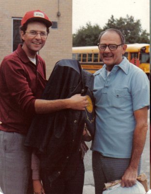 Dick, Kris (under jacket) and Dad