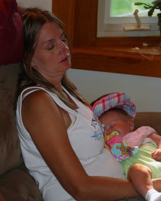 Tired mama and baby