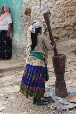 Tribal woman tending to her duties