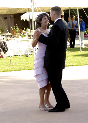 The groom dancing with his Mom