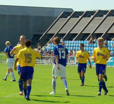 The mates come by to congratulate the 3-0 score Cheering.jpg