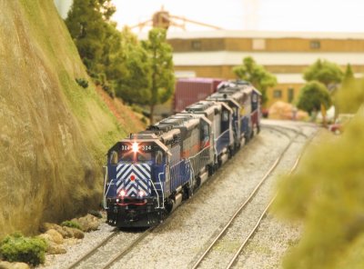 SD45-2 MRL 304 leading a train down the grade.