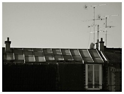 Light and shadows playing on a rooftop