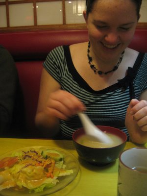 emily eats miso soup.