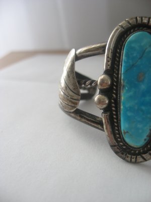 turquoise bracelet.