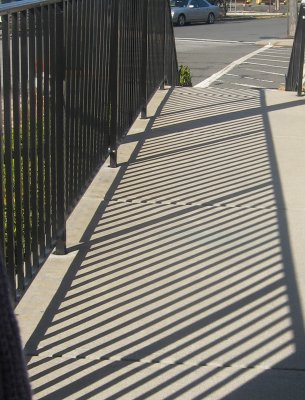 railing shadows at the millington bank.