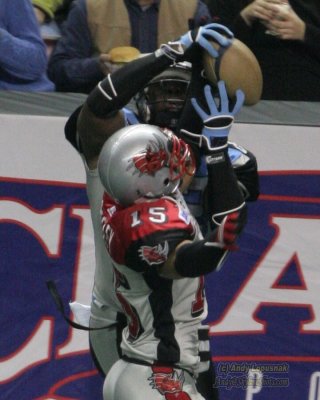Kansas City Brigade WR Boo Williams grabs a touchdown over Grand Rapids Rampage DB Chuck Wesley