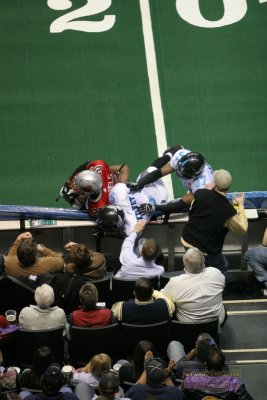 Grand Rapids Rampage WR Ronney Daniels gets tackled into the boards