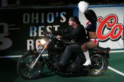 Columbus Destroyers cheerleader on a motorcycle