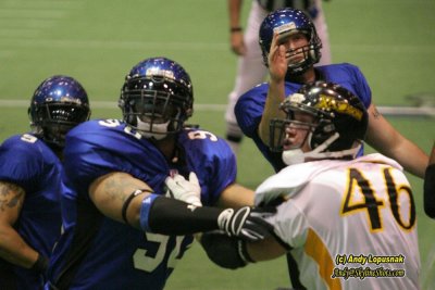 Michigan Pirates kicker Anthony Gallagher watches an extra point