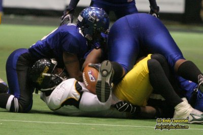 Michigan Pirates gang up on an Xplosion ball carrier